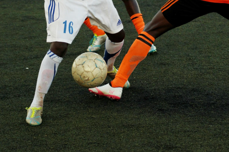 Soccer players and ball